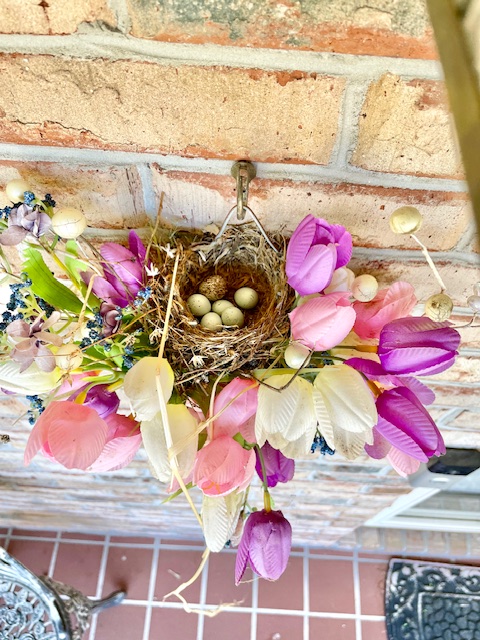 Nest with eggs in a flower arrangement 